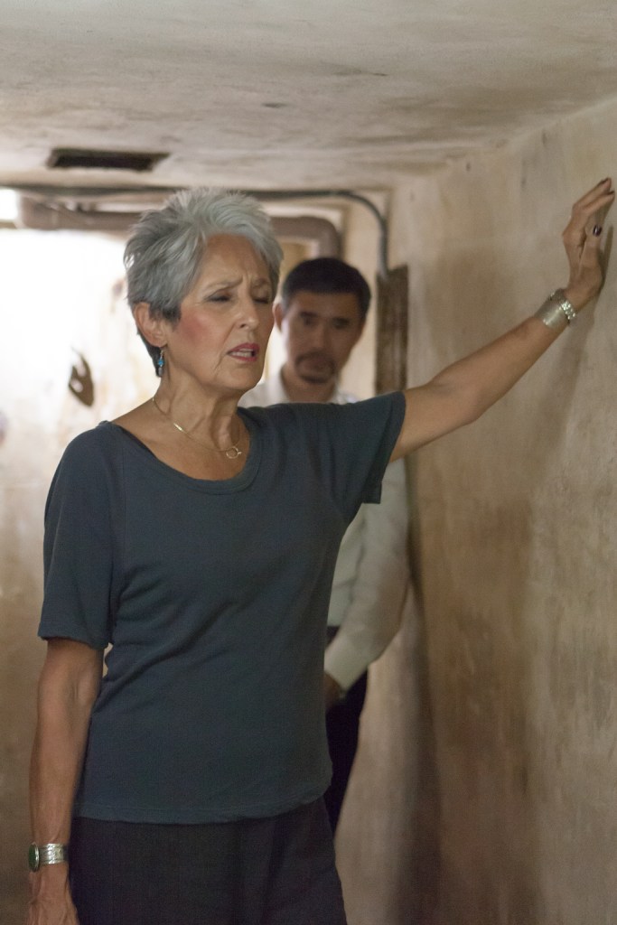 Joan Baez - a moving moment of silence - at the Metropole air raid shelter, where she had spent so many fearful moments.