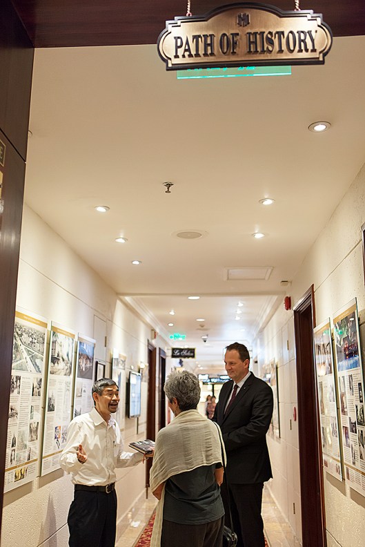 General manager Kai Speth and History Ambassador Duc show Joan Baez through the Path of History