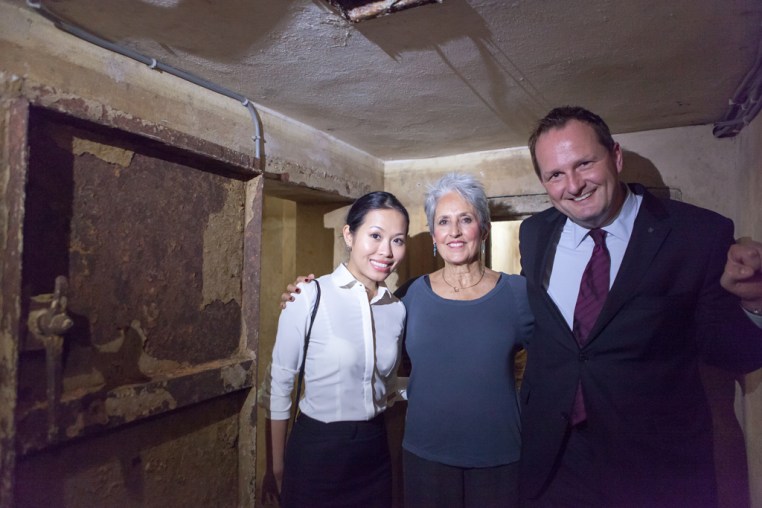 Joan Baez - with director of PR; Le Nhung, and general manager Kai Speth - at the Metropole air raid shelter, where she had spent so many fearful moments.